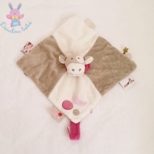 Doudou plat Vache Lola beige crème blanc rose attache tétine NOUKIE’S