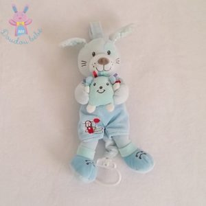 Doudou Chien musical bleu TEX