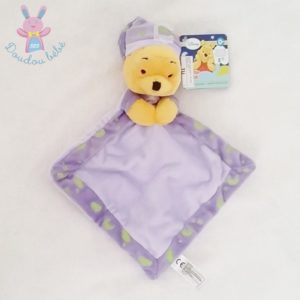 Doudou plat Winnie l’ourson mauve luminescent DISNEY