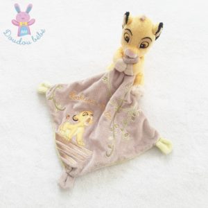 doudou le roi lion Simba dans une feuille avec papillon DISNEY