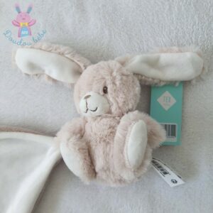 peluche mon doudou musical TEX BABY lapin marron beige coussin brodé  étoiles H 20 cm assis boîte à musique