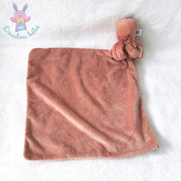 Doudou Pieuvre rose blanc mouchoir couverture rose JELLYCAT
