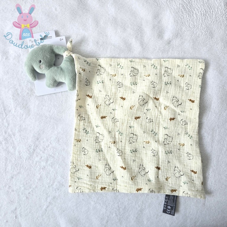 Doudou éléphant vert mouchoir lange beige motifs ORCHESTRA