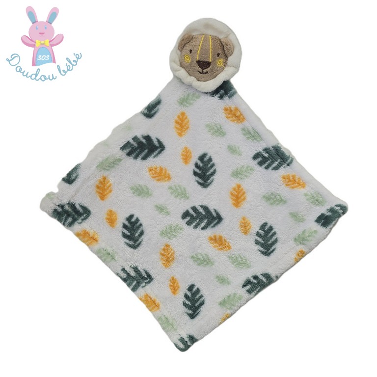 Doudou plat Lion polaire blanc vert feuilles TOM & KIDDY